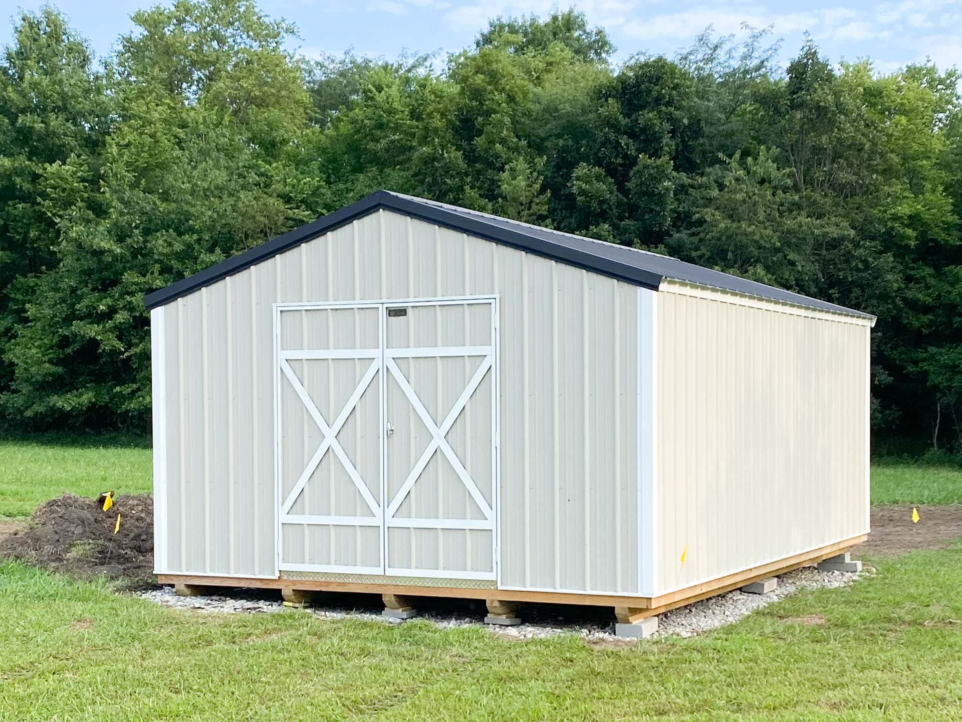 14x44 cream colored metal ranch shed with black metal roof for sale in MO & KY