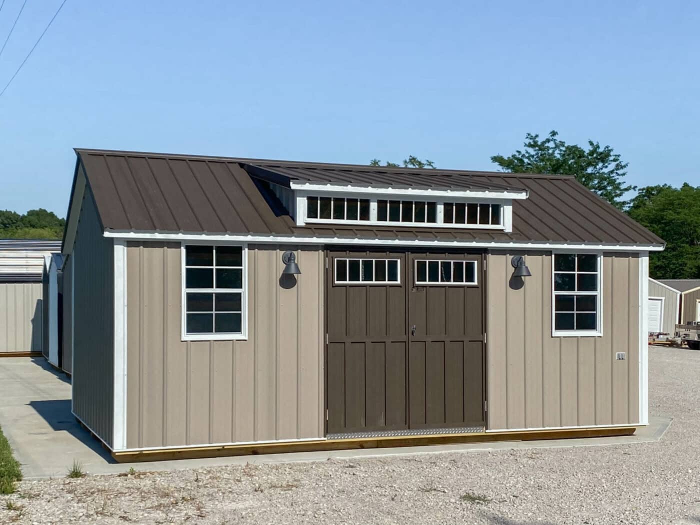 brown cottage shed in Missouri made by Premier Barns