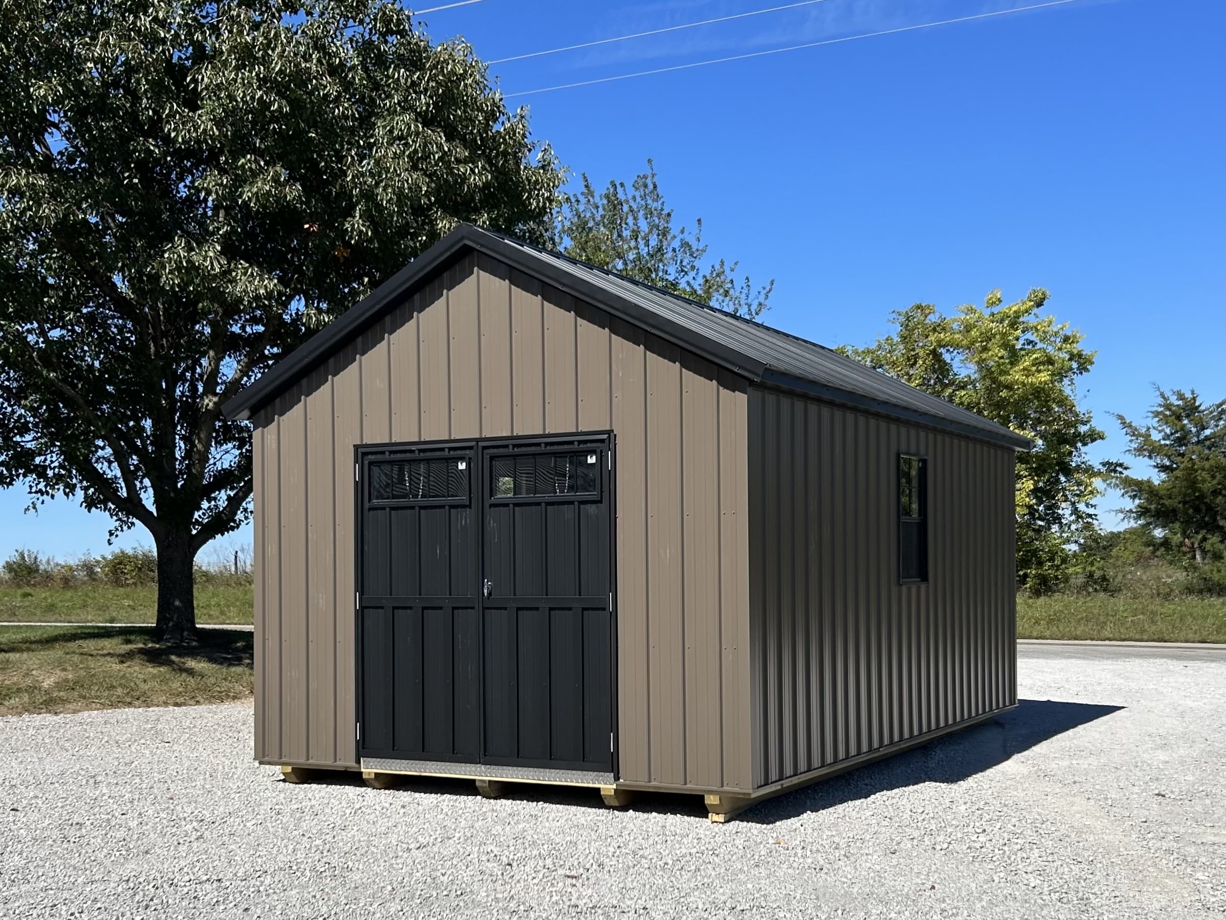 a brown storage shed with a black door for sale near Overland Park KS