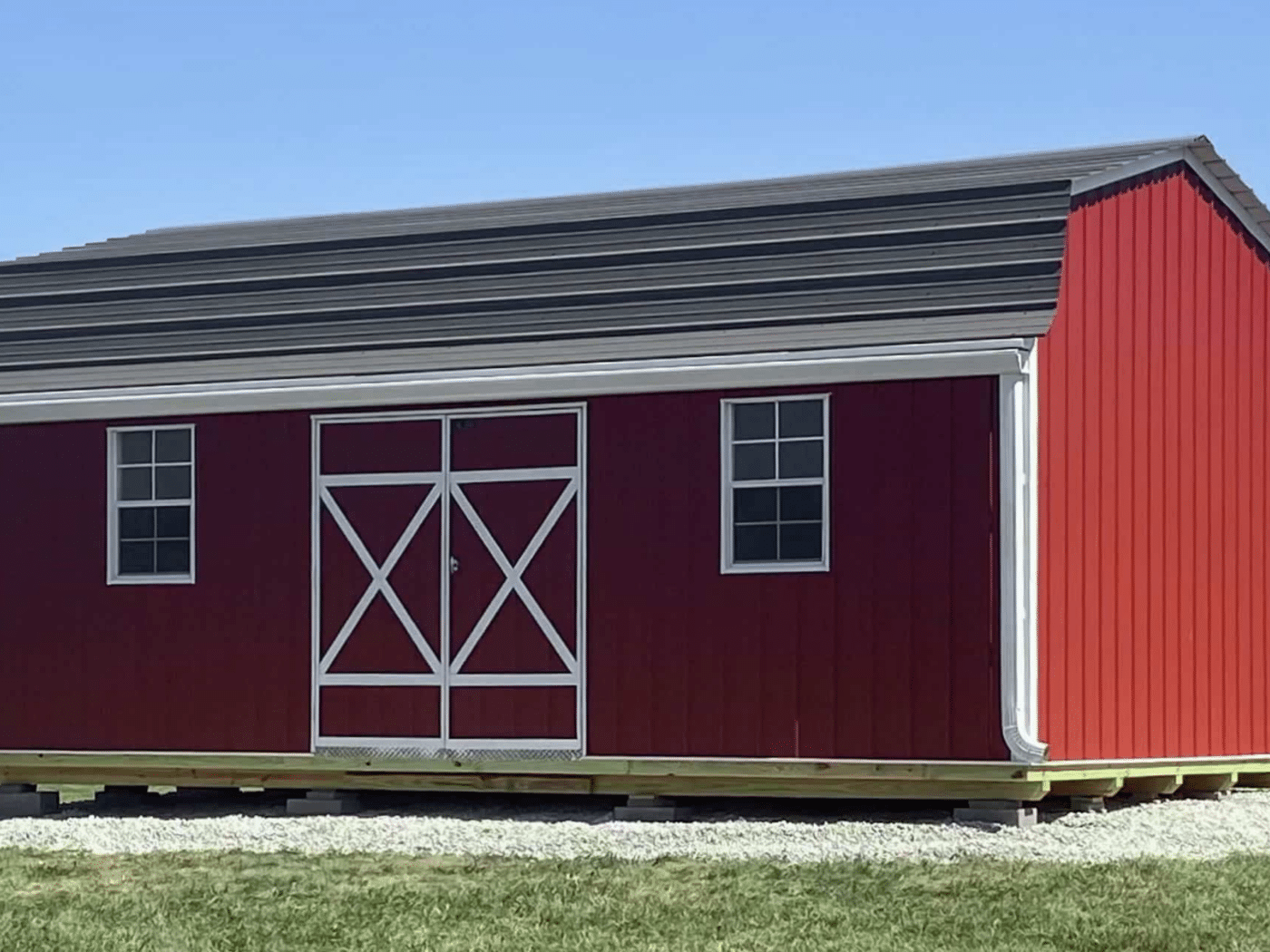 red and white lofted highwall barn in missouri