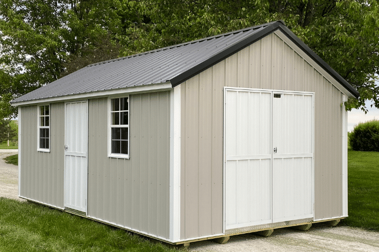 tan and white trimmed cottage 10x12 sheds in Missouri